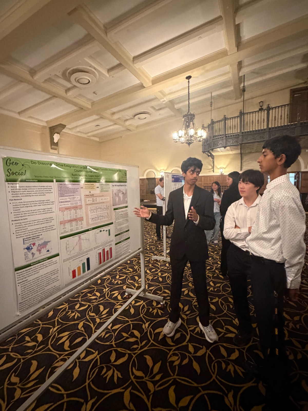 2026 SSTP student presenting research poster